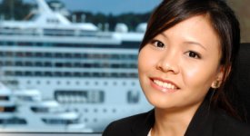 careers on cruise ships Crew Member Posed by Cruise Ship Photo Button