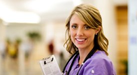 RN Poses for Picture in Hospital Hall