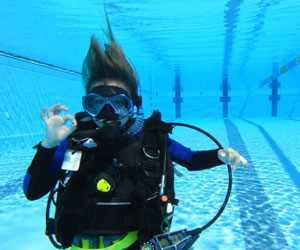 Teaching SCUBA diving at a Resort Requires Proper Certification and Plenty of Experience