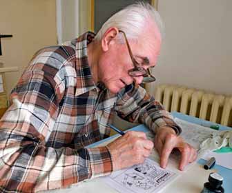 Cartoonist Working in Home Office Photo