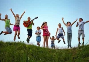 Kids Jumping for Photo at Summer Camp