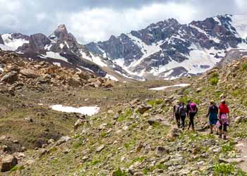 Backpacking Group Takes Day Hike to Alpine Lake Photo