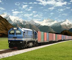 Train Transporting Freight Through Mountains Picture