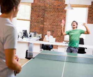 Playing Ping Pong Game In Office Picture