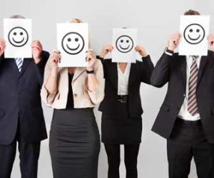 Happy Employees With Smiley Face Masks Picture