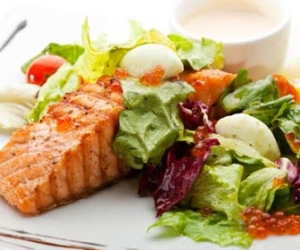 Healthy meal of salmon and salad picture