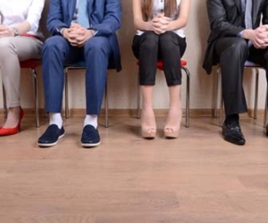 Four job candidates waiting for job interview