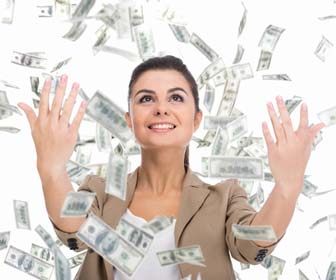 Woman throwing money in air with high paying job