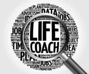 Magnifying glass focused on life coach jobs
