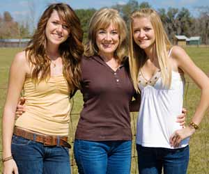 Mom and Daughters Pose for Photo at Colorado Dude Ranch
