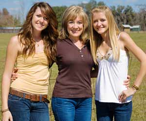 Mom and Daughters Pose for Photo at Colorado Dude Ranch
