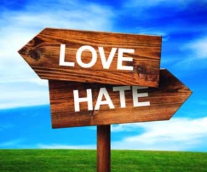 Love/Hate direction arrows against blue sky background graphic