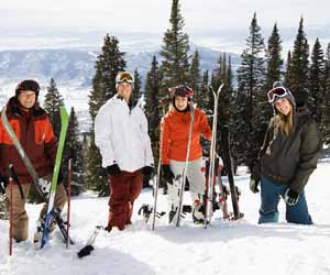 Family Poses for Picture While on Ski Vacation