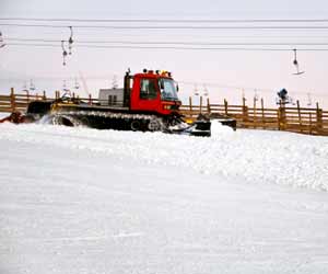 Snow Plow Grooming Ski Slopes
