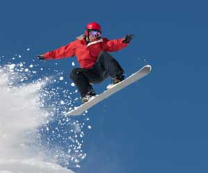 Snowboarder Getting Air off Jump
