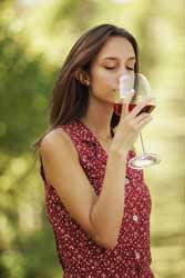 Woman Drinking a Glass of Merlot Wine