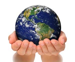 Two hands holding planet earth against white background