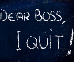 "Dear Boss, I Quit!" written on a chalkboard