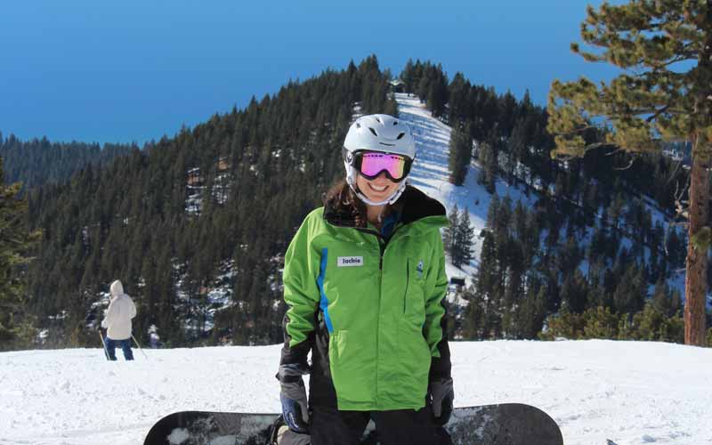 Diamond Peaks Ski Resort Employee Stops for Picture while Snowboarding
