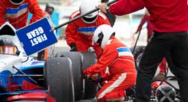 Pit Crew Changed Tire during Formula 1 Grand Prix Race