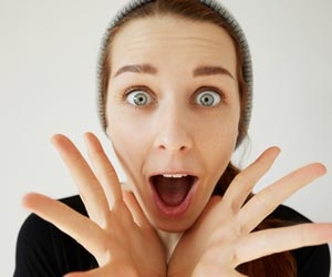 Excited woman using hands to express emotions