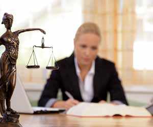 Legal Attorney Working at Her Desk