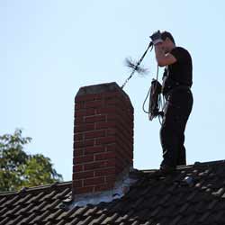 Chimney Sweeps Take on the Dirty Task of Cleaning Chimneys