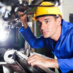 Millwrights Work with Various Machinery in Different Types of Factories
