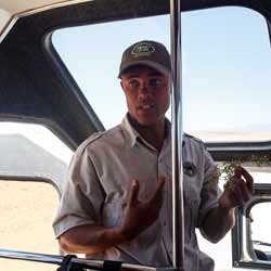 Safari Guides Point Out Wild Animals to Tourists While Providing Relevant Information