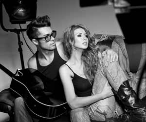 Male and Female Model on Couch for Photo Shoot